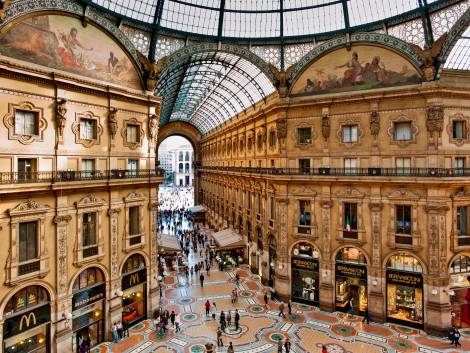 Elevated view of Galleria Vittorio Emanuele II in Milan on May 2, 2012. Built in 1875 this gallery is one of the most popular landmarks in Milan. The picture, taken from a hardly accessible balcony, offers a unique view of the gallery from above